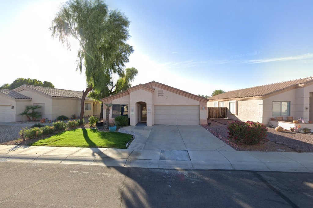 Street View exterior associated with the verified address for Desert Palms Adult Care Home, LLC in Surprise, Arizona.
