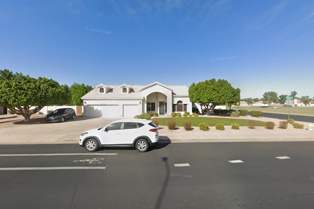 Street View exterior associated with the verified address for Extended Family Home in Mesa, Arizona.
