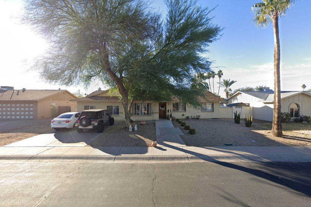 Street View exterior associated with the verified address for Happy Foster Family Adult Care Home LLC in Tempe, Arizona.